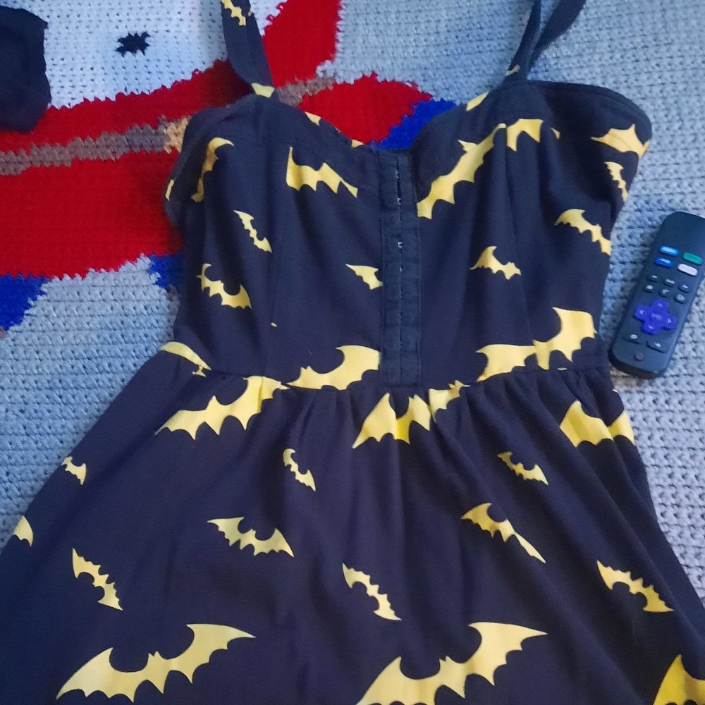 Black dress with yellow bats